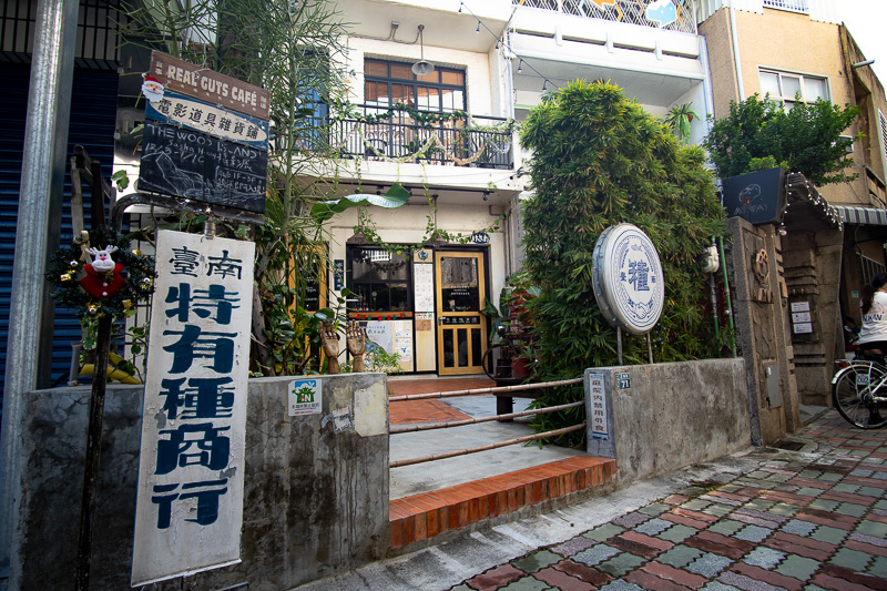 The interesting facade of Tainan's Real Guts Cafe and exterior courtyard.