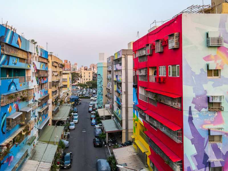 A bird's-eye-view of the Lingya neighborhood. Nearly every wall is covered by a mural.