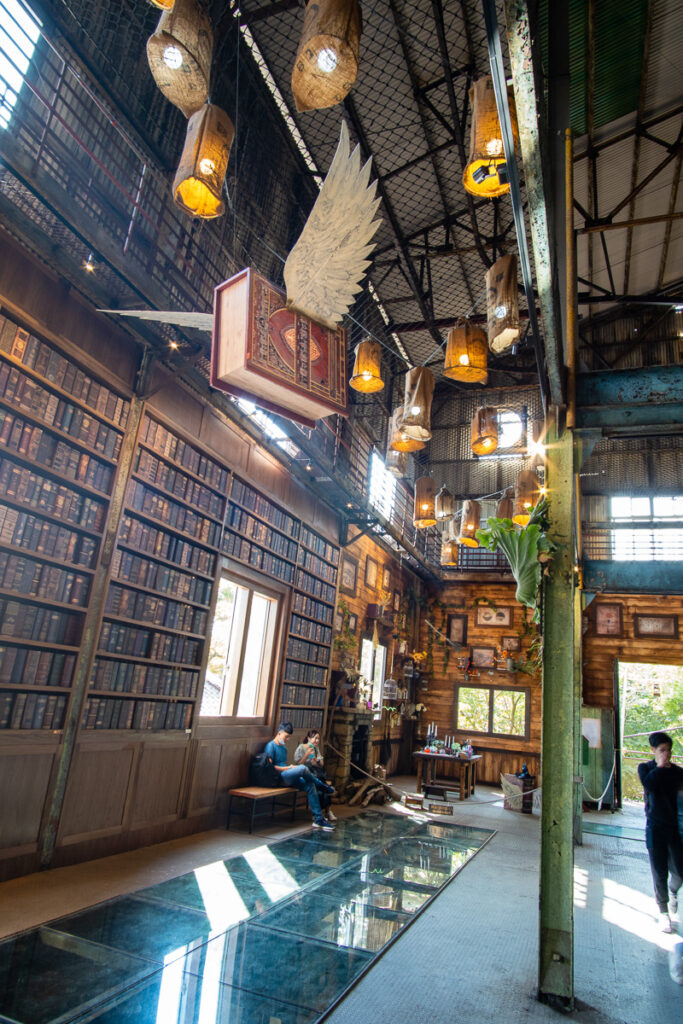 The repurposed factory in Ten Drums Culture Village is decorated with hanging books for a lighter mood.