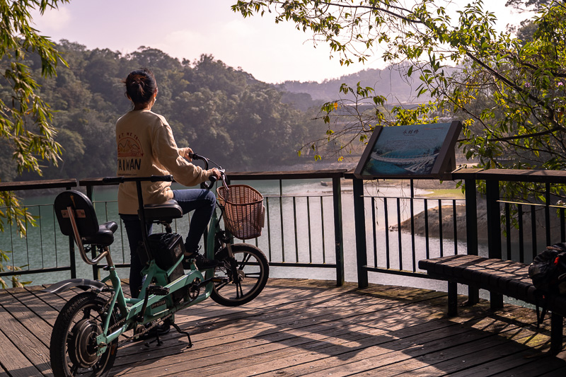 Viewing the landscape of the lake from the bike trail.