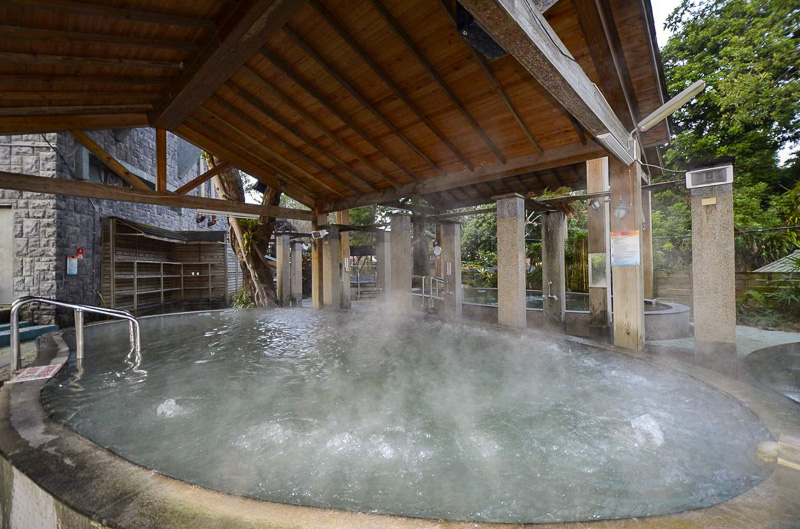 A steaming hot spring pool at Guanziling.