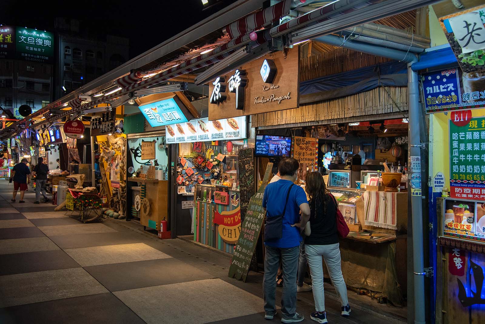 A row of neatly decorated indigenous restaurants in Hualien's Dongdamen Night Market.