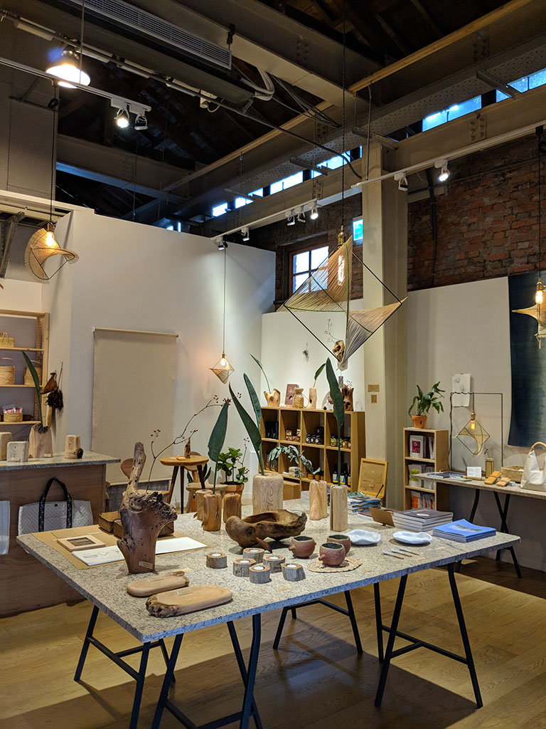 Art, household products, and creative products are on display in a boutique in Huashan 1914 Creative Park.