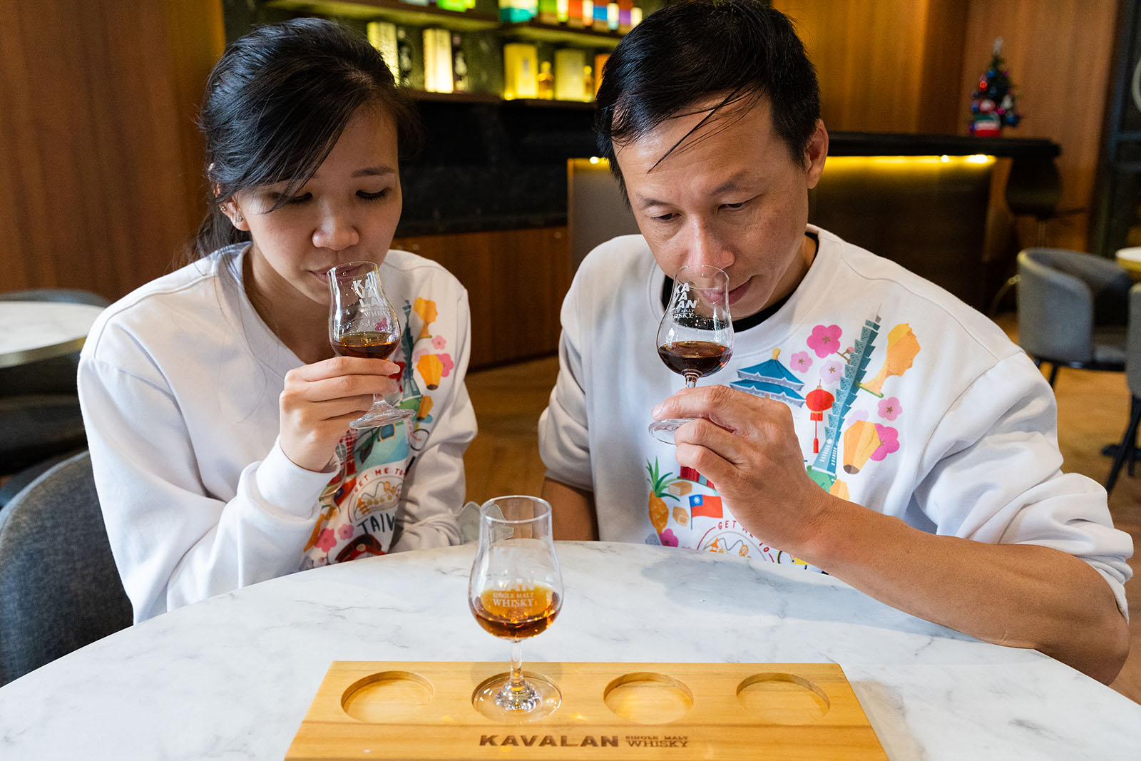 A couple tastes Whiskey at Yilan's Kavalan Distillery.