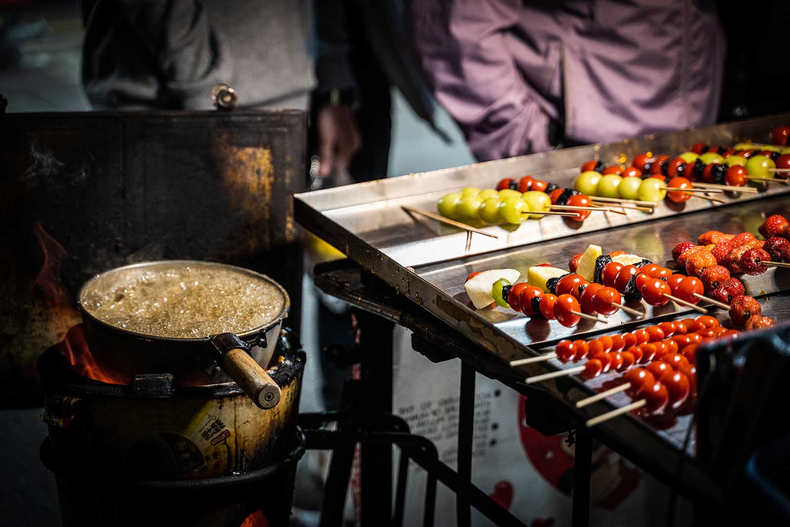 Glazed fruit skewers are in display in Keelung Night Market.