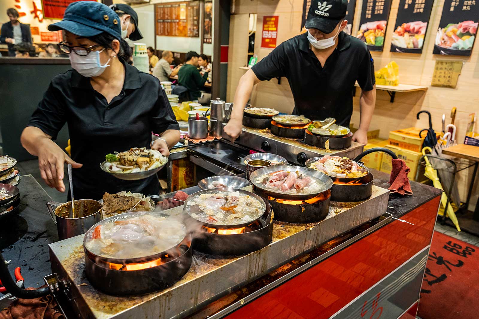 The kitchen at a single-serve hot pot shop.