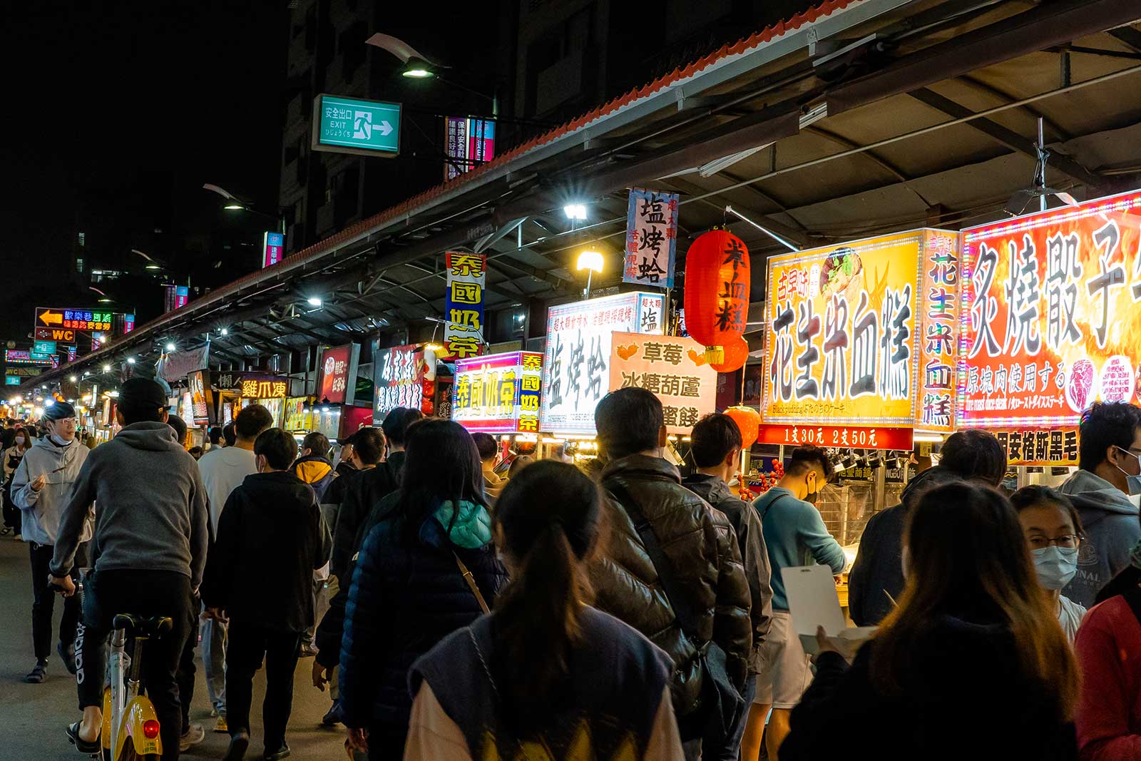 A crowded night market street in Taiwan.