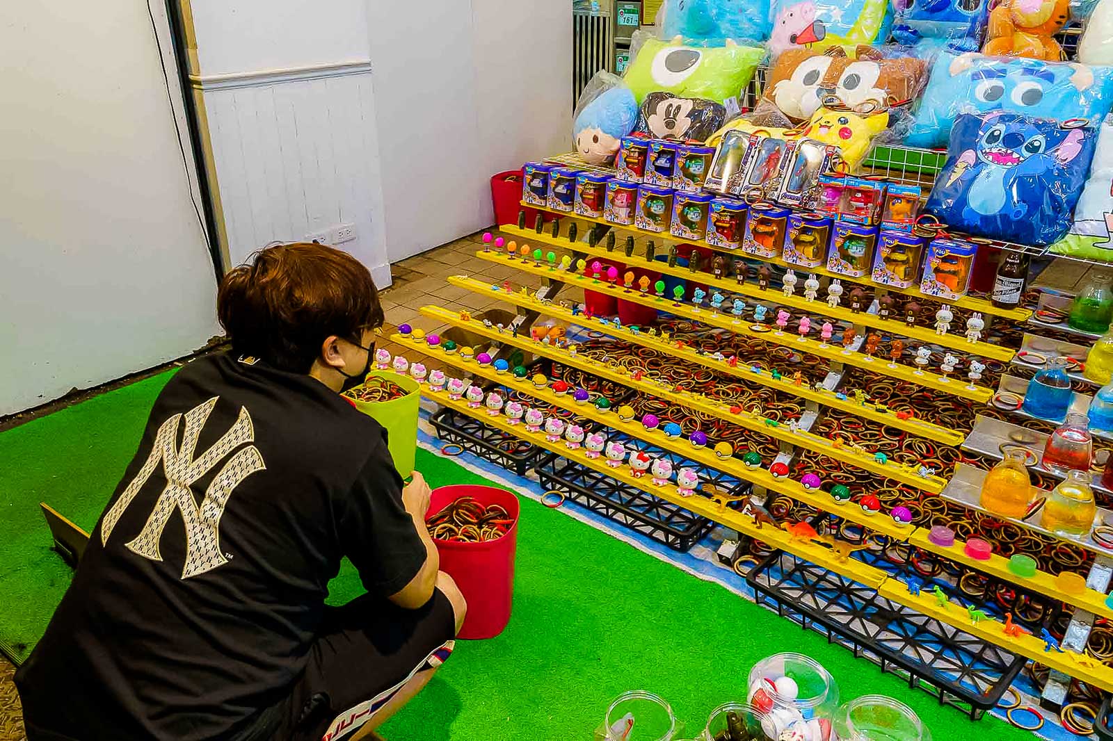 Another ring toss type night market game.