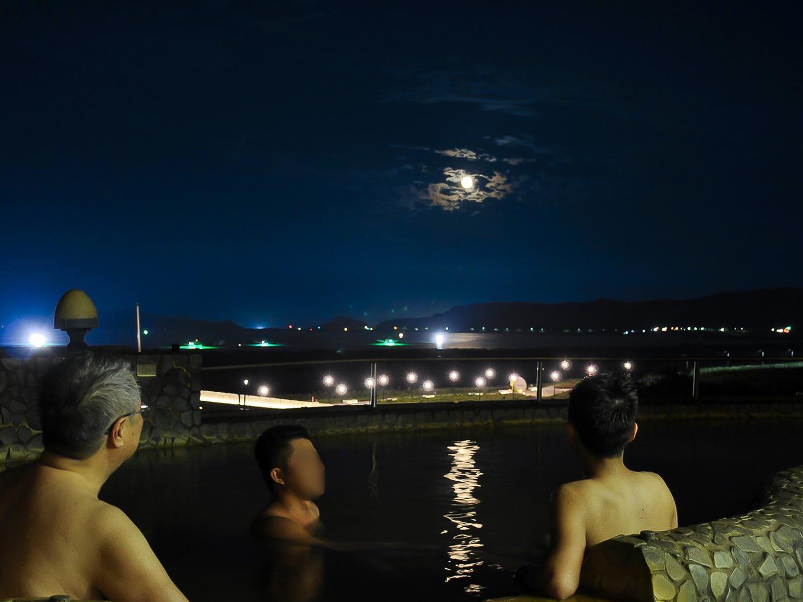 Bathers enjoy a moonlight soak Governor-General Hot Spring in Jinshan.