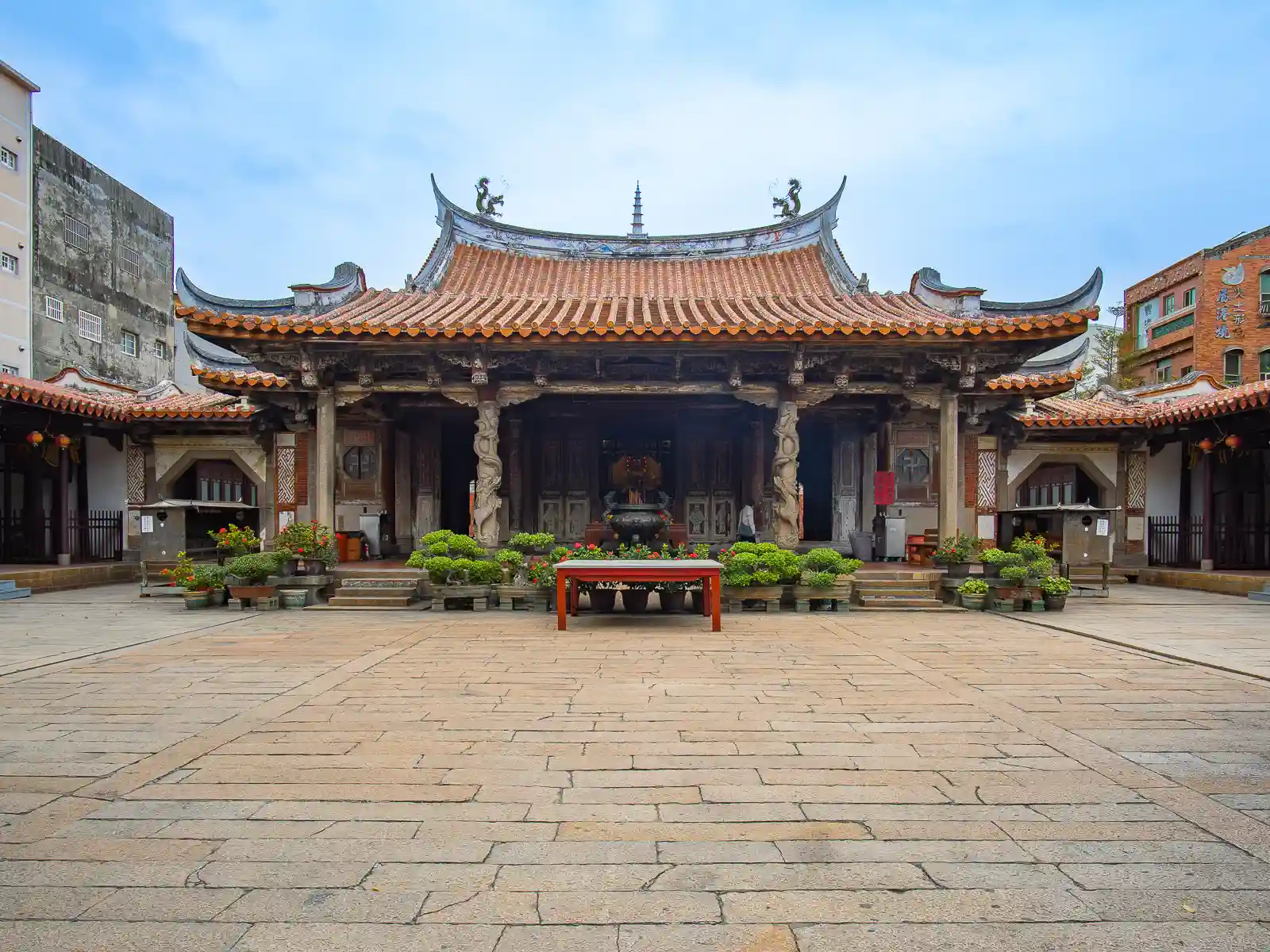 The central courtyard and front facade of the main hall of Lukang Longshan Temple.