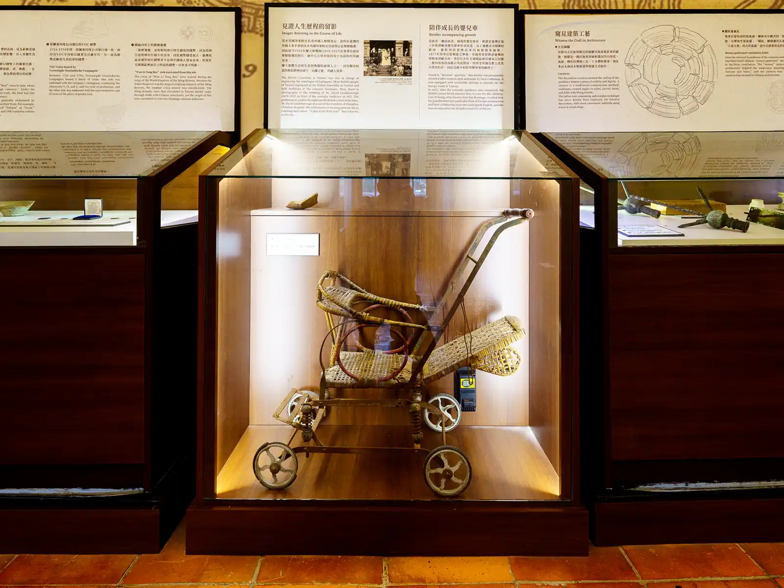 An antique stroller is on display.