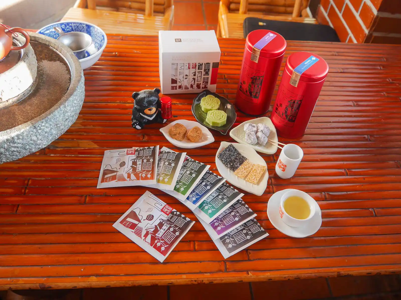 A photo of a spread of tea and snacks.