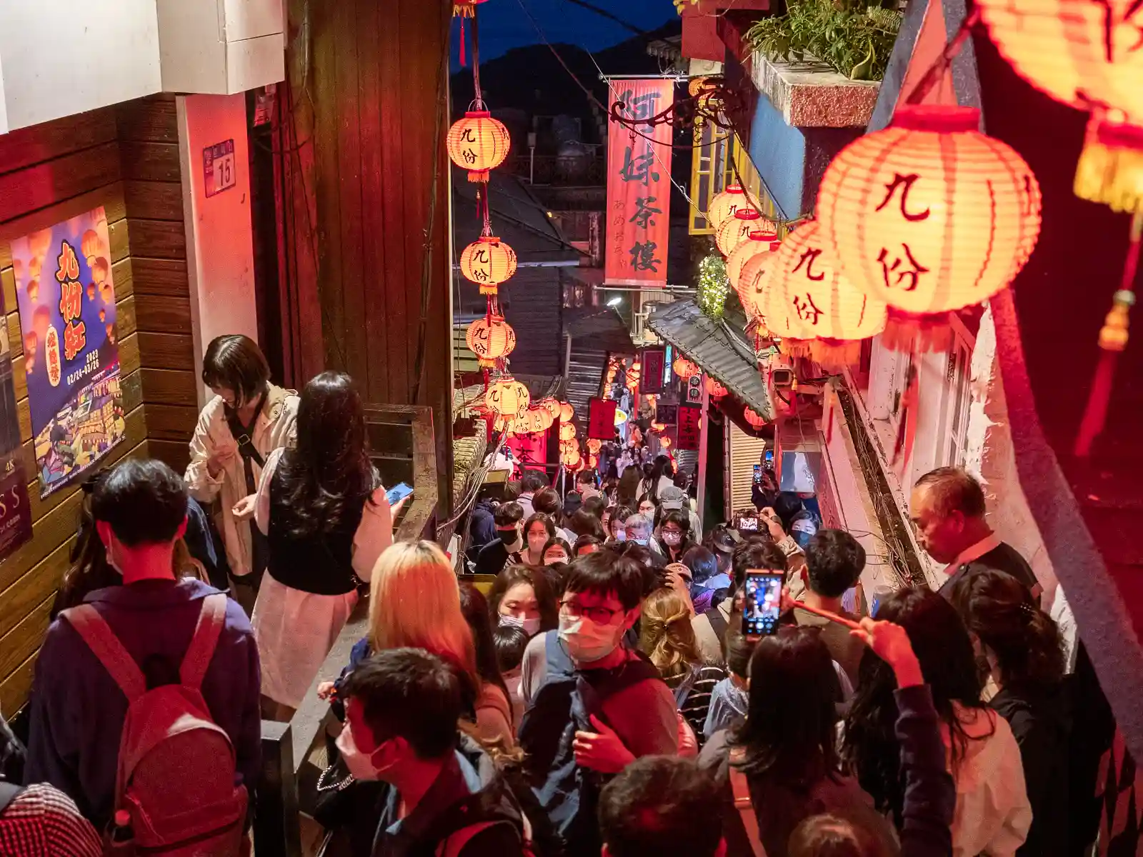 Jiufen's Shuqi Road is a waterfall of people.