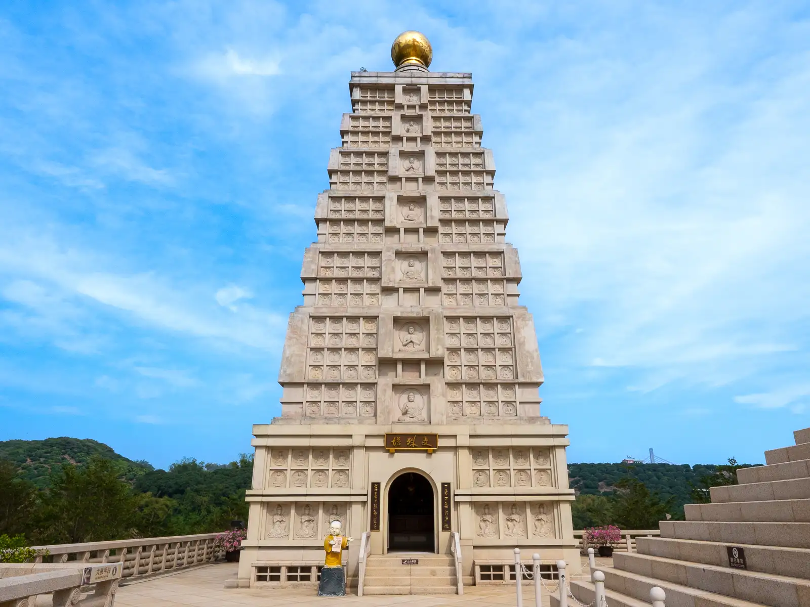 The Manjusri Stupa is shaped like a tall spire.