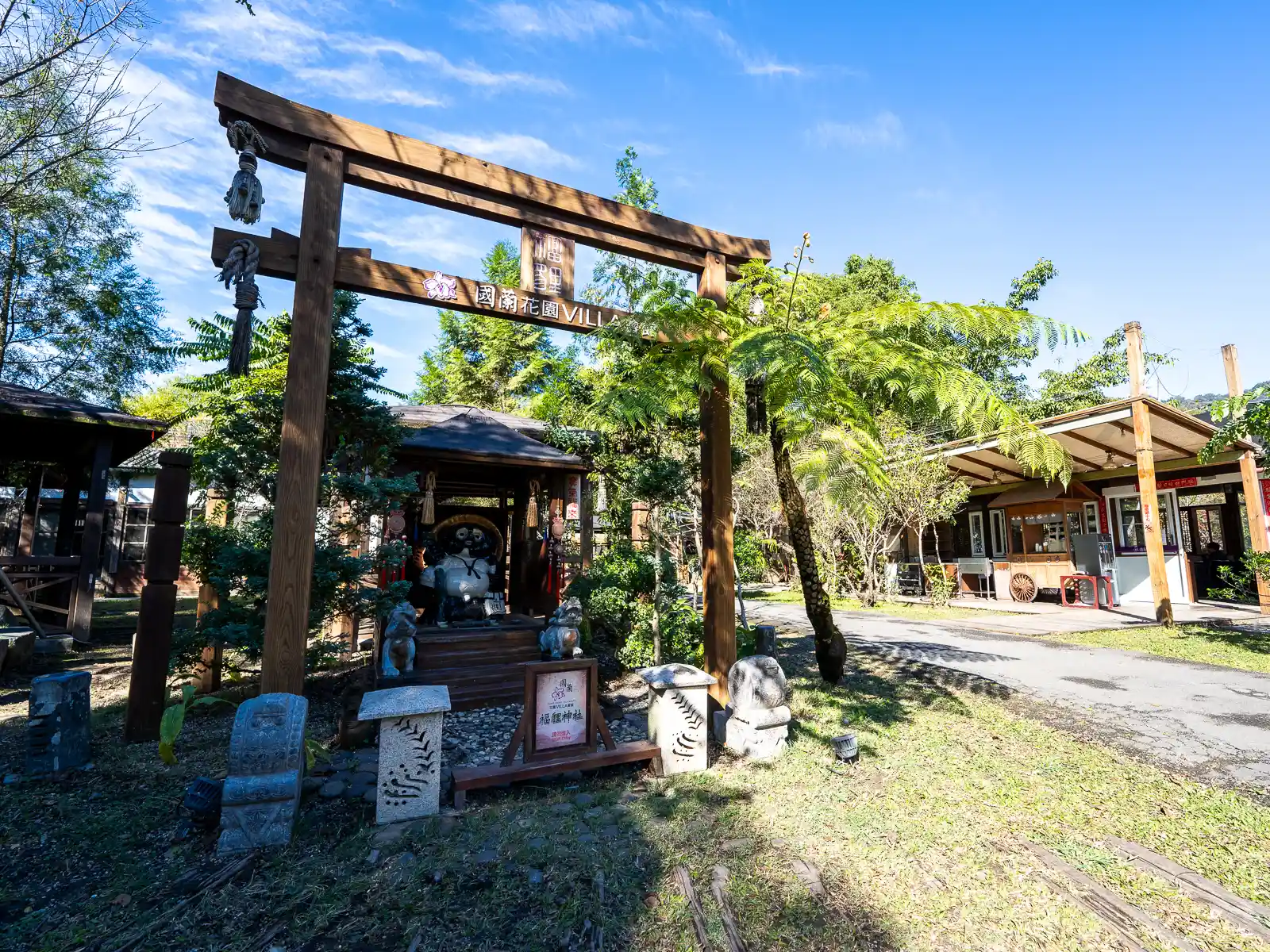 The entrance to a lush hot spring resort.