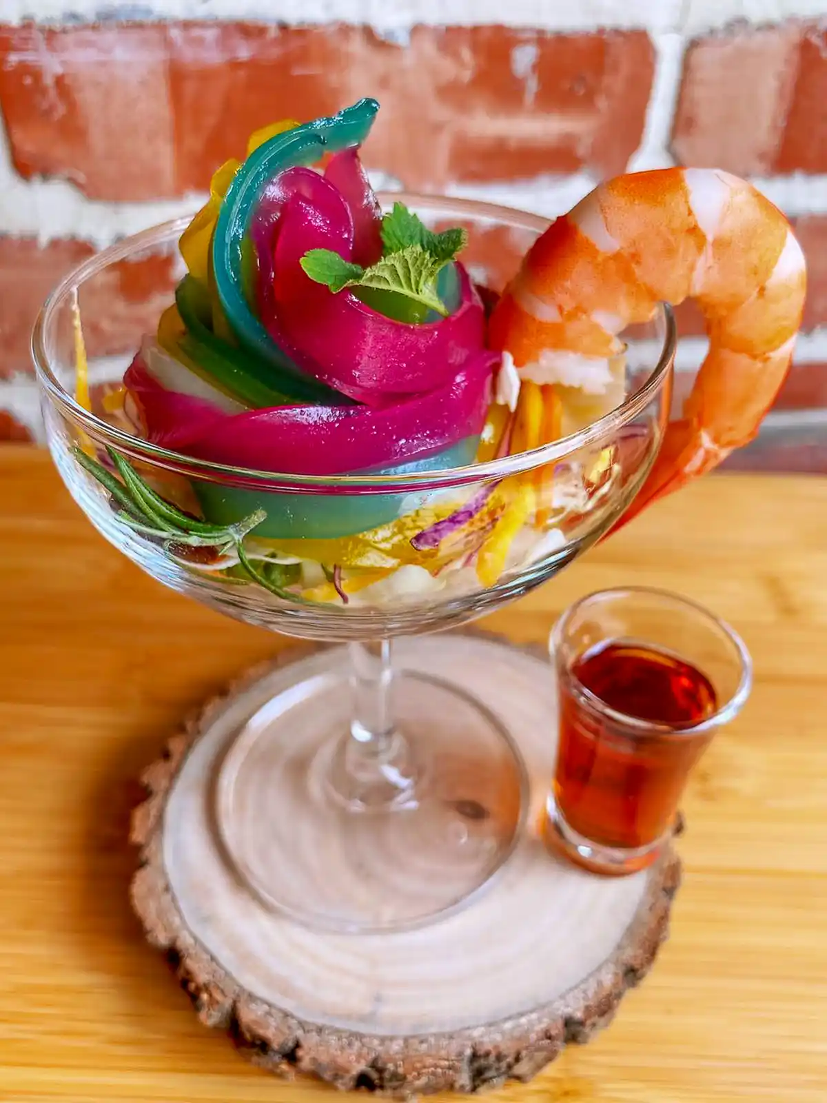 Shrimp cocktail made with rainbow noodles.