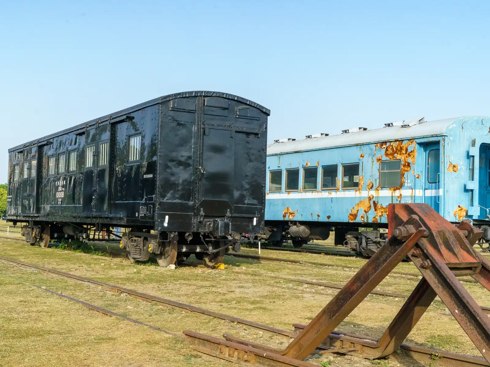 Retired passenger cars stand parked in the Hamasen Railway Culture Park.