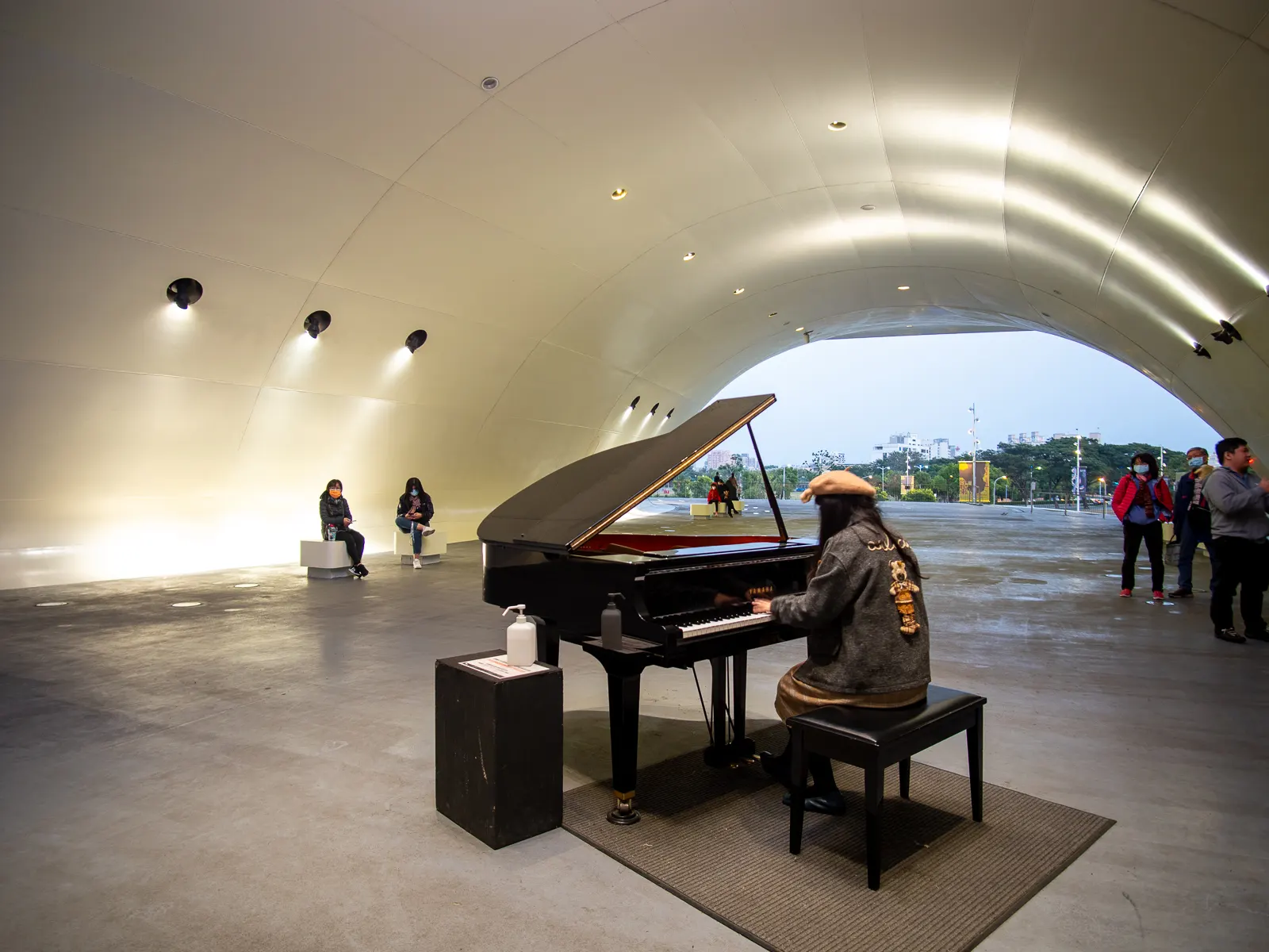 A performance taking place in an outdoor hall.