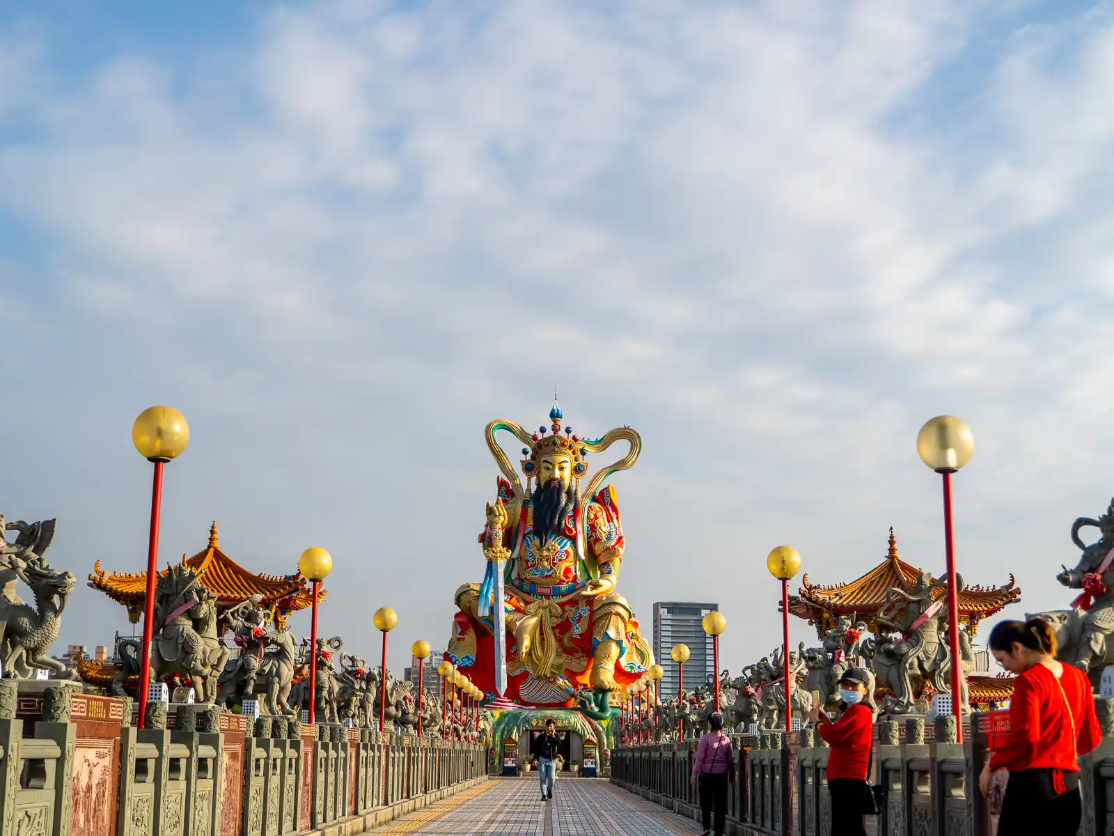 A massive statue of the Taoist god Xuanwu is built over Lotus Lake.