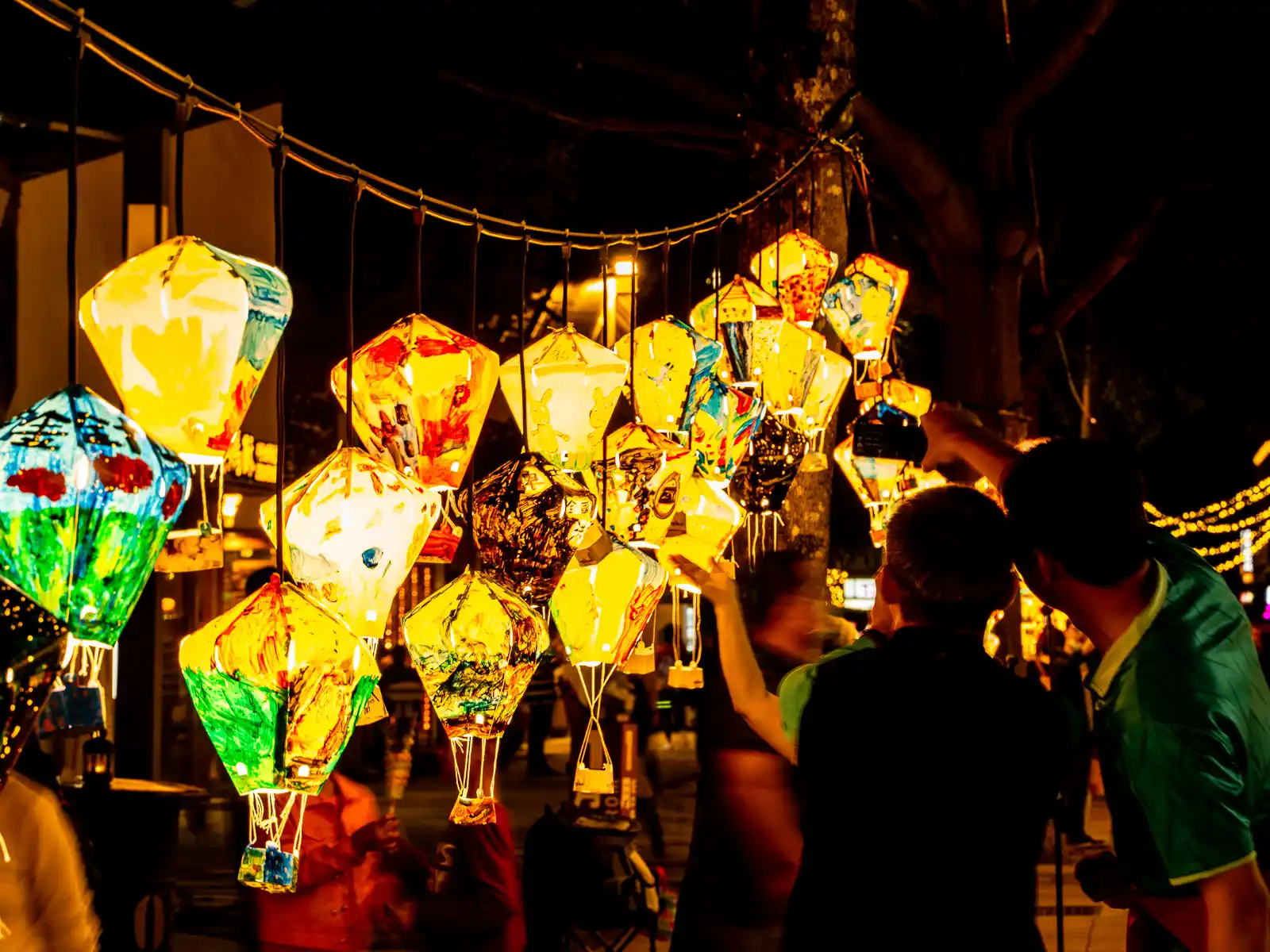 Miniature hanging painted lanterns decorate one corner of the park.