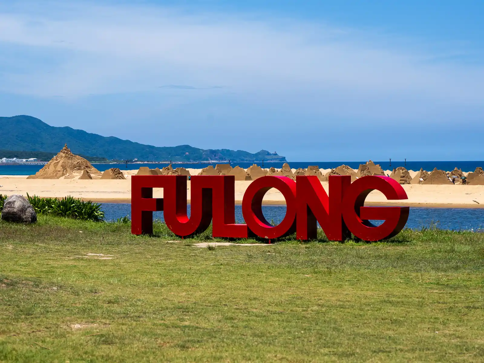 A landmark sculpture nearby the Fulong International Sand Sculpture Art Festival location