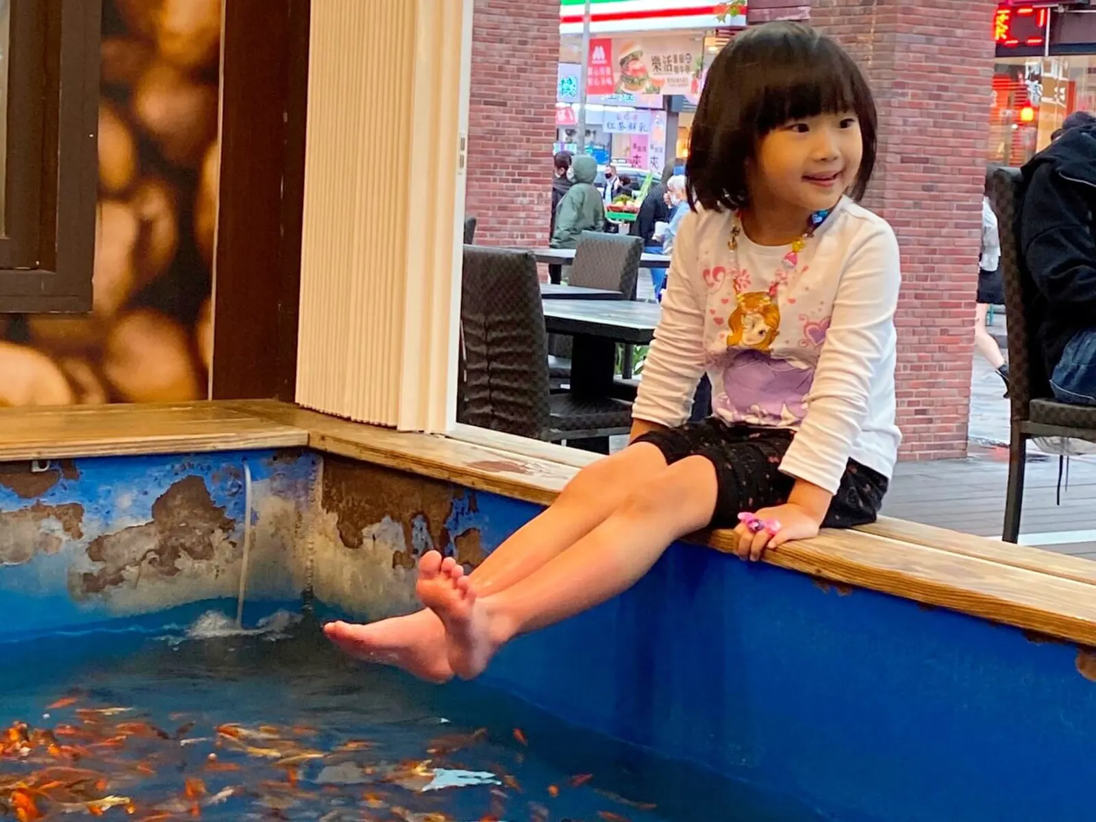 A child is doing the foot bath