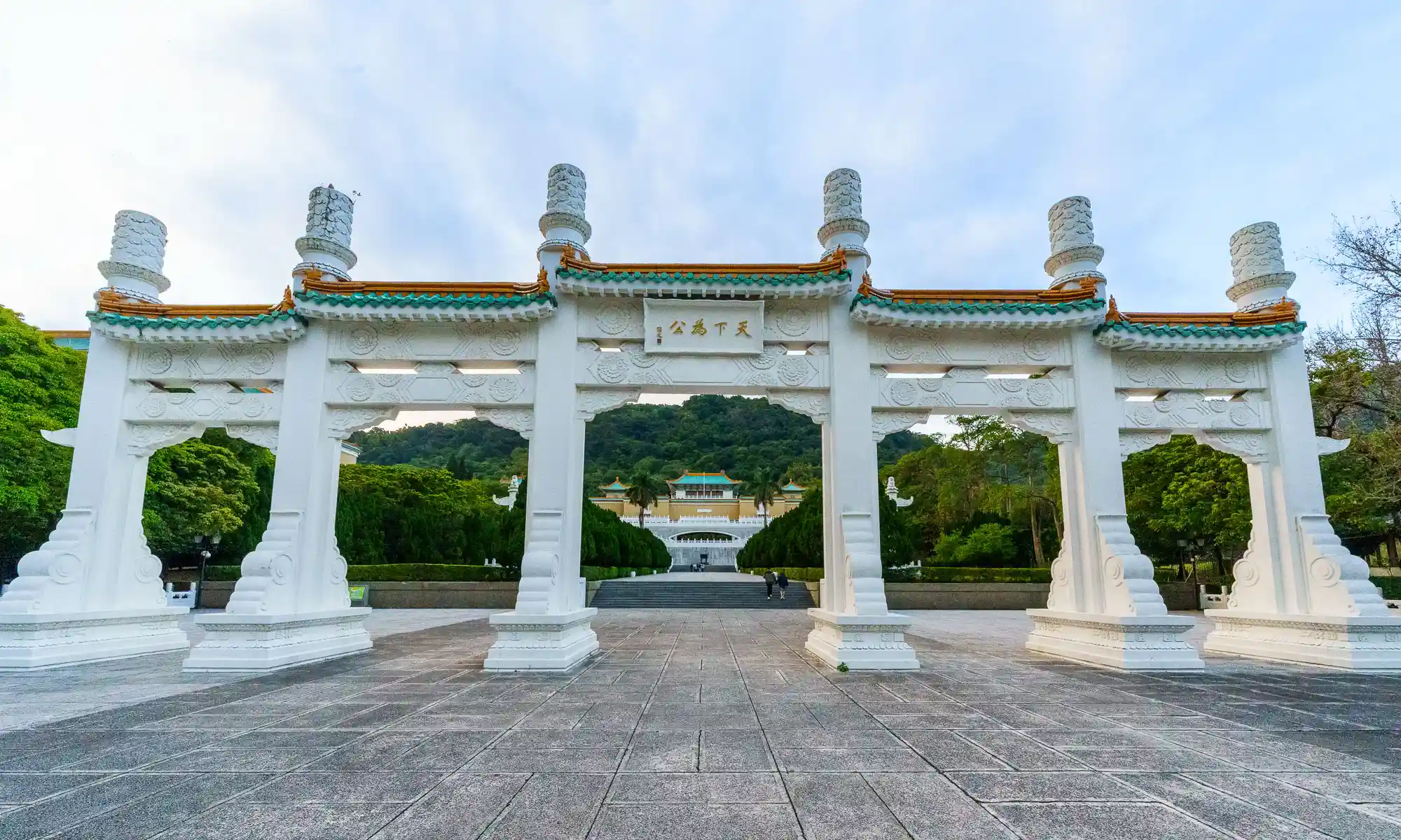 A classical five-arch gate marks the entrance to the National Palace Museum.