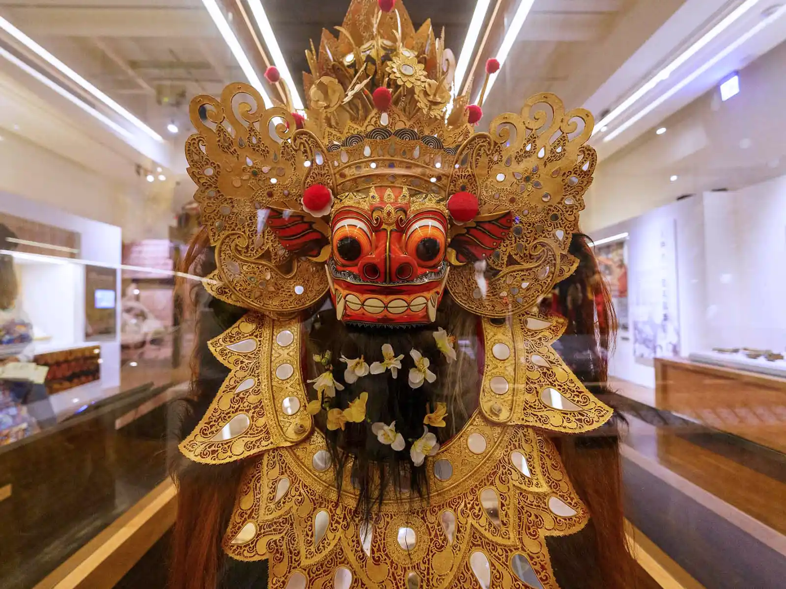 An elaborately decorated gold mask.